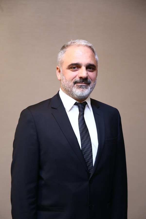 M. Gökmen AYDINLI
